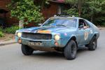 По улице Лермонтова едут британцы на AMC AMX (1968 год)